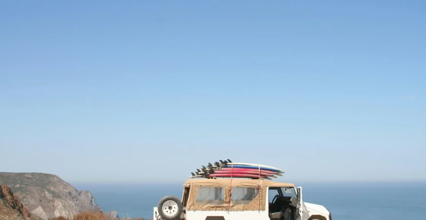 Smiling Man Surfing Net Laptop While Drinking Coffee Bar 1 1 873x450